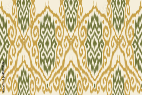 Seamless green and yellow ethnic ikat pattern with traditional ornamental shapes and swirl motifs. Decorative abstract textile design for fabric, wallpaper, and wrapping.