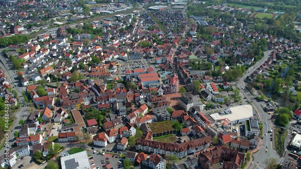 A panorama aerial around the old town of the city Lage in Germany during a sunny day in springtime