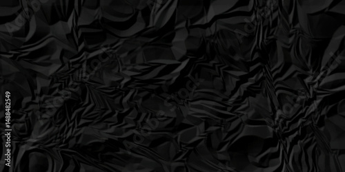 Black crumple obsolete billboard rumple. wrinkle ripped creased black crumple aged closeup craft document grunge recycling paper background.	
