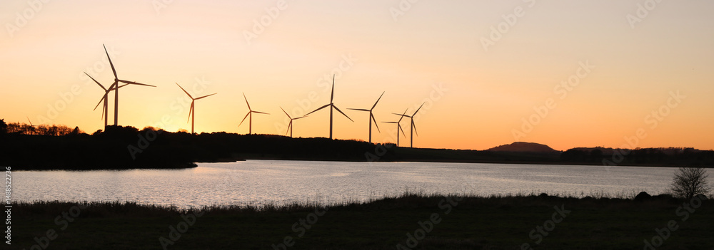 Fototapeta premium wind turbines at sunset