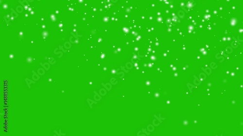 Loop snow animation and motion graphics big and small snowflakes and falling snow, snowfall with green background