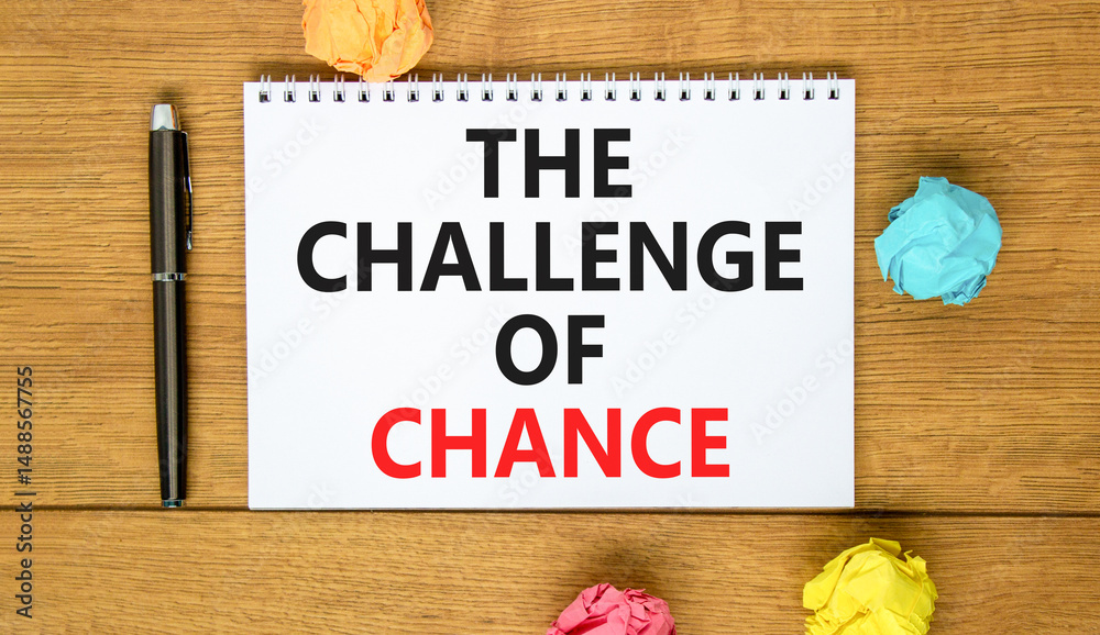 Fototapeta premium The challenge of chance symbol. Concept words phrase The challenge of chance on beautiful white note. Colored paper. Beautiful wooden background. Business The challenge of chance concept. Copy space.