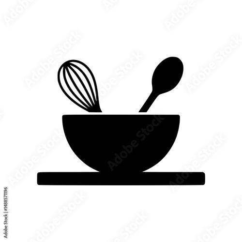 Kitchen utensils in a bowl on a platform