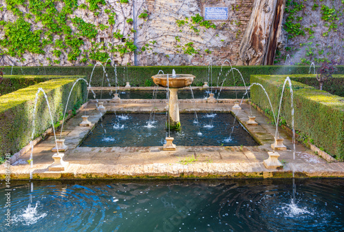 Fountain in Generalife gardens at Alhambra palace, Granada, Spain