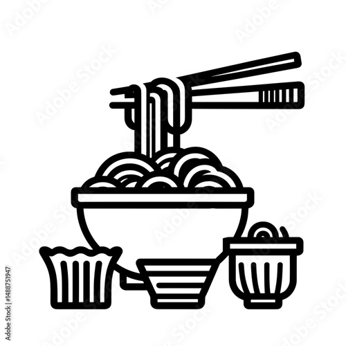 Noodles with chopsticks in bowl accompanied by side dishes and sauces  