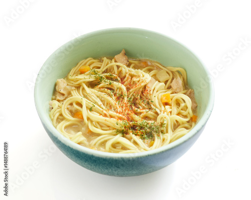 Isolated Warm Bowl of Chicken Noodle Soup With Vegetables on a White Background