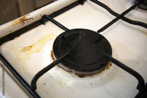 Dirty gas stove close up
