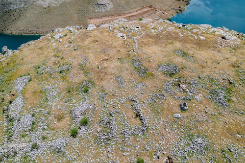 Aerial View of Ancient Settlement Remains along the Euphrates River with Surrounding Canyons – Hidden Archaeological Site in Southeastern Turkey
