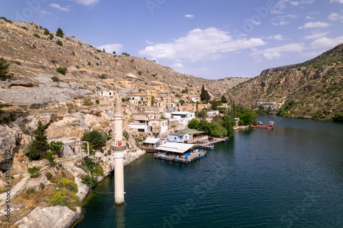 Aerial View of Submerged Village in Halfeti, Şanlıurfa – Partially Sunken Mosque Minaret and Historic Stone Houses on the Euphrates River