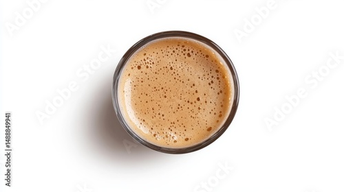 A glass of soda, seen from above, isolated on a white background.
