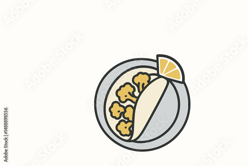 Minimalist taco with lemon slice and vegetables on a plate  
