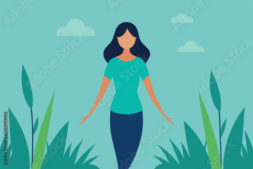 Beautiful woman in a summer dress smiles in a green meadow under the sun