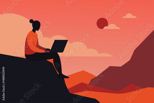 Silhouette of a man working on a laptop with a stunning sunset sky