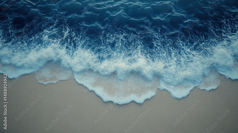 Ocean waves crashing on a sandy beach