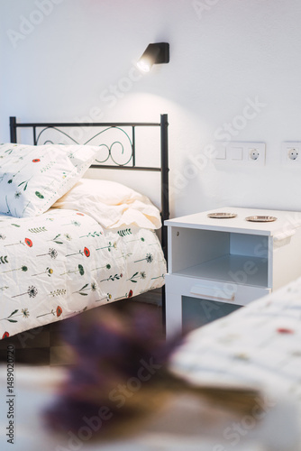 Bed in bedroom with pillows. Hotel.
