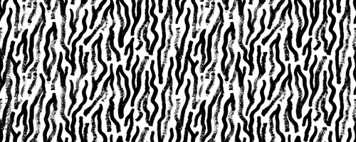 Brush drawn zebra motif seamless pattern. Curved and wavy vertical stripes, bold brush strokes background.