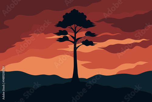 silhouette of a tree in the mountains