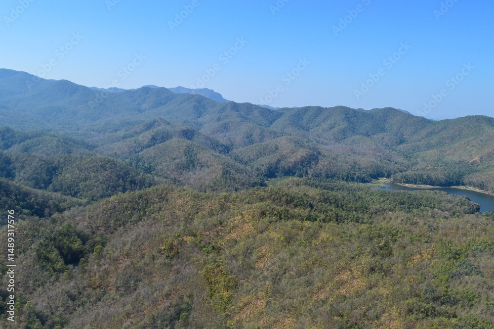Distant Mountains and Forest with Trees and Sky in Northern Thailand. Distant Mountains and Forest with Trees and Sky in Northern Thailand.