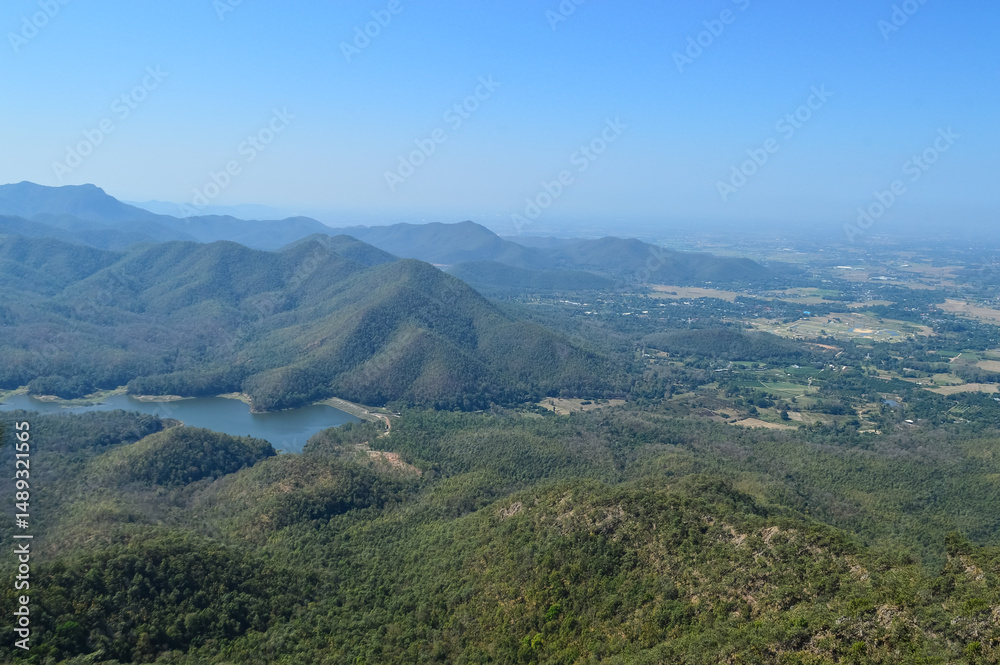 Fototapeta premium Distant Mountains and Forest with Trees and Sky in Northern Thailand.