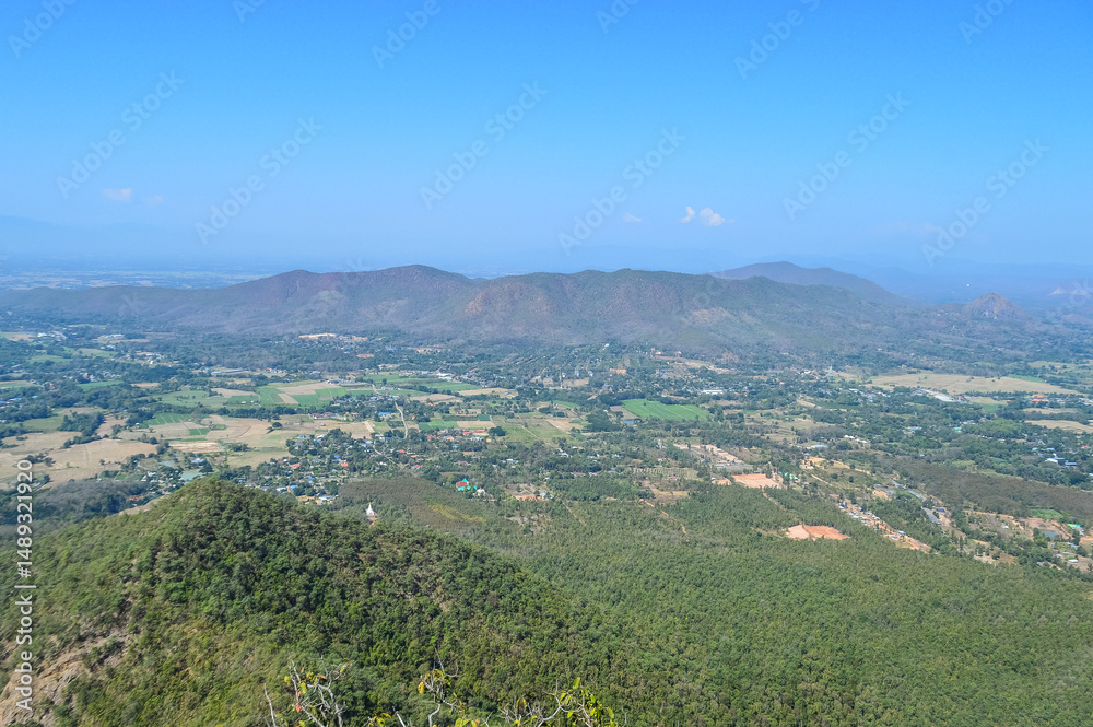 Fototapeta premium Distant Mountains and Forest with Trees and Sky in Northern Thailand.