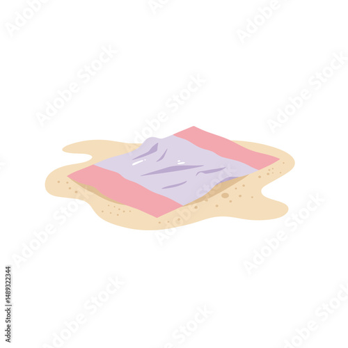 Wet towel lying on sand at the beach during a sunny day - Concept of travel  