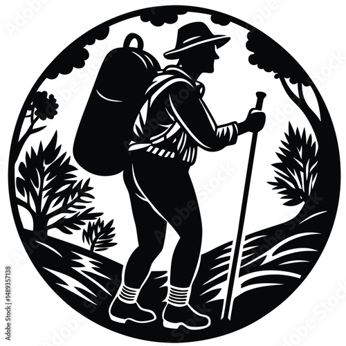 Silhouette of Person Leaning on Hiking Stick in Nature