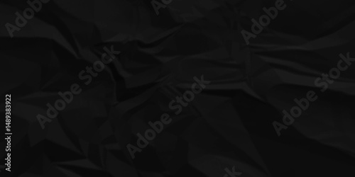 Dark black crumpled paper background. old paper wrinkle texture pattern. cardboard wrinkled arts craft and Seamless black crumpled paper.	