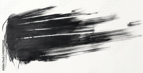 Abstract black brush strokes sweeping horizontally across a white background creating a dynamic and textured visual impression of movement and intensity
