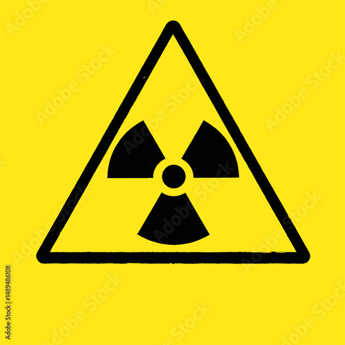 Warning Triangle with Radiation Symbol on Yellow Background