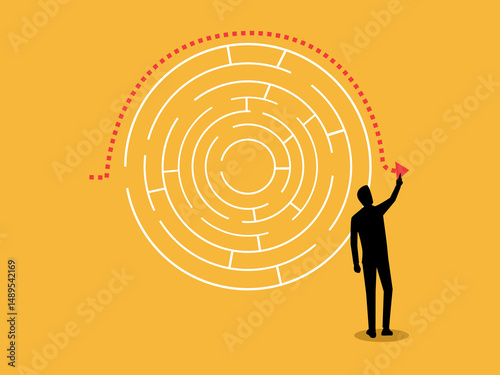 Businessman thinking outside the box solving a maze