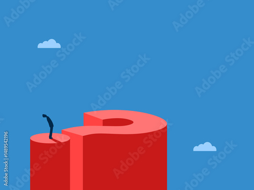 Visionary businessman standing on a question mark