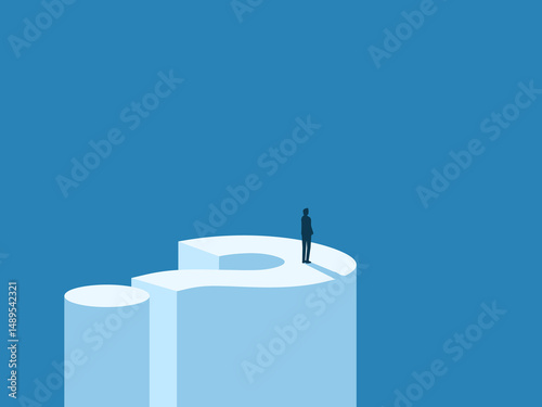 Challenge, visionary businessman standing on a question mark