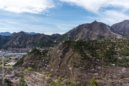 
The scenery of the Juyongguan section of the Great Wall in Beijing, China, amidst green mountains and white clouds