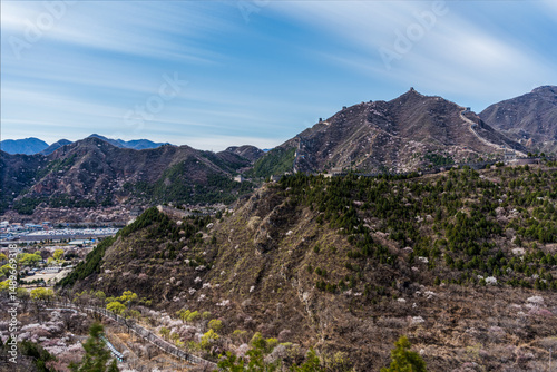 
The scenery of the Juyongguan section of the Great Wall in Beijing, China, amidst green mountains and white clouds