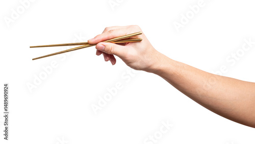 isolated of a man's hand holding a golden chopstick.