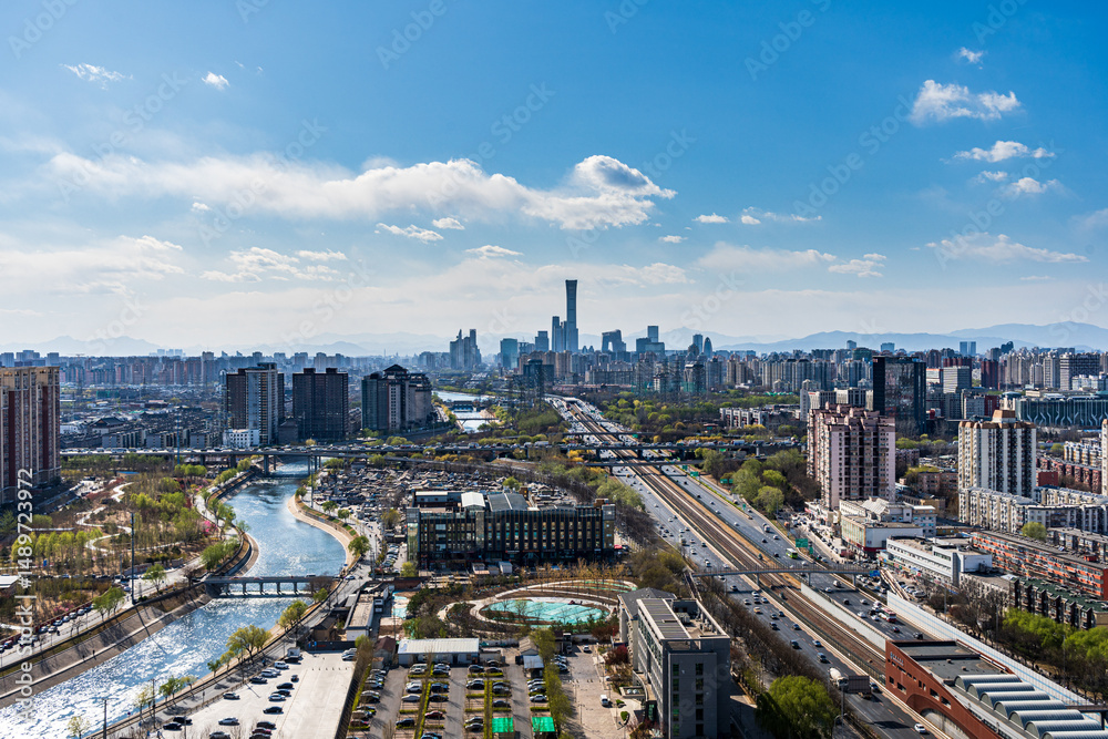 Fototapeta premium The cityscape of Beijing, China, with its towering skyscrapers and river landscapes
