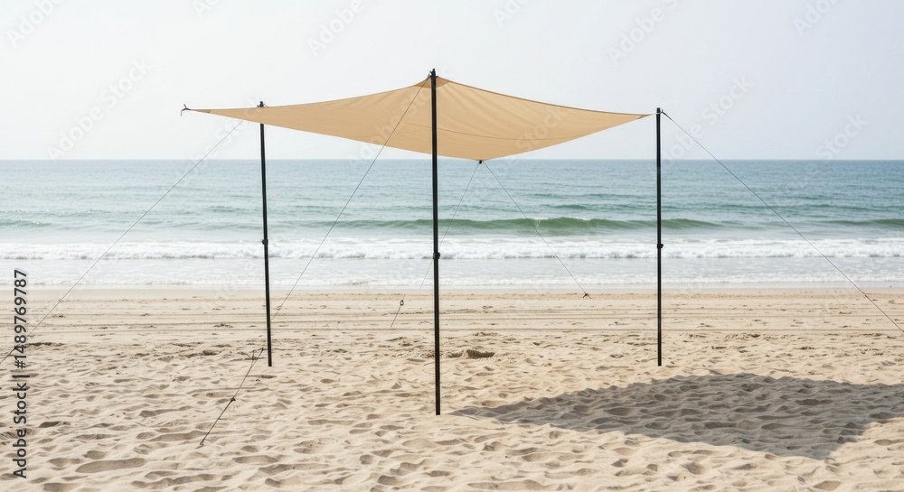 Fototapeta premium Tan Beach Canopy Shade on Sandy Shore