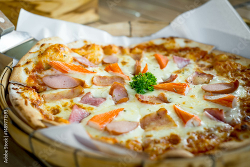 фотографія A delicious pizza topped with various meats and vegetables, garnished with parsley, served in a rustic basket