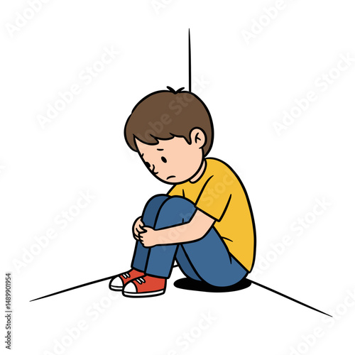 Sad young boy sitting alone in corner while feeling lonely and upset