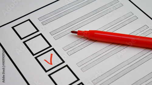 Person selects candidate with red marker on ballot. Italy elections. Transparent voting process ensures citizens active participation in political decisions