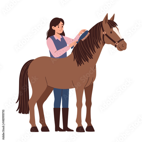 Woman grooming a horse while smiling and standing in a stable with copy space