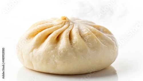 Steamed bun with a fluffy texture and visible steam, showcasing its warm and fresh appearance.