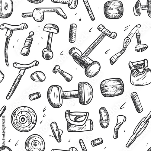 Seamless black and white hand drawn vintage gym and fitness equipment pattern with dumbbells kettlebells barbells and handles