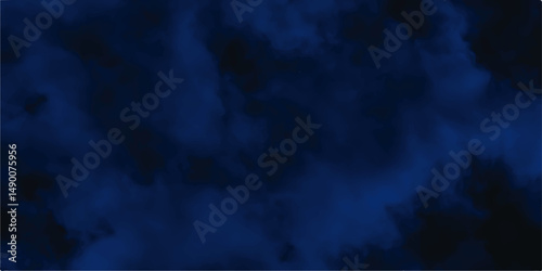 Luxurious watercolor textures on dark blue paper background.black and blue sunny cloudscapes in soft watercolors background texture. creative vintage foggy stains graphic design.