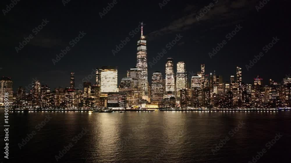 Night New York Skyline At Manhattan New York United States. Bustling Downtown Cityscape With Modern Buildings. Building Sky Background Illuminated Urban. Town Exterior Downtown Panning Wide. Night New York Skyline At Manhattan New York United States. Bustling Downtown Cityscape With Modern Buildings. Building Sky Background Illuminated Urban. Town Exterior Downtown Panning Wide.