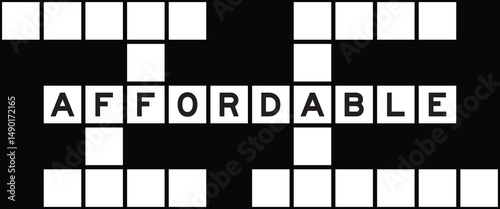 Alphabet letter in word affordable on crossword puzzle background