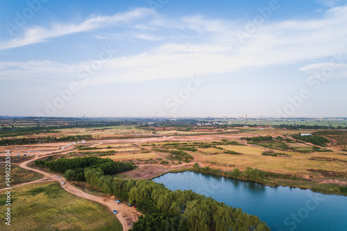 Aerial View of a Quarry Landscape with Water Feature