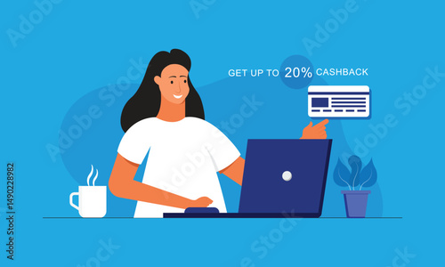Happy smiling woman sitting with laptop and taking a bank card to get cashback