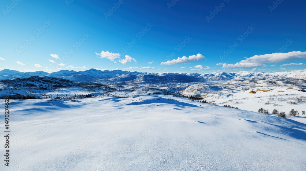Fototapeta premium Snowy mountain landscape adventure rocky mountains aerial view clear sky nature's beauty