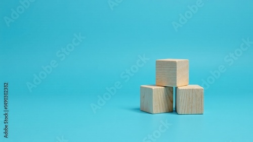 Wallpaper Mural Uncluttered Simplicity Three Light Wooden Blocks Arranged on a Vibrant Blue Background Torontodigital.ca